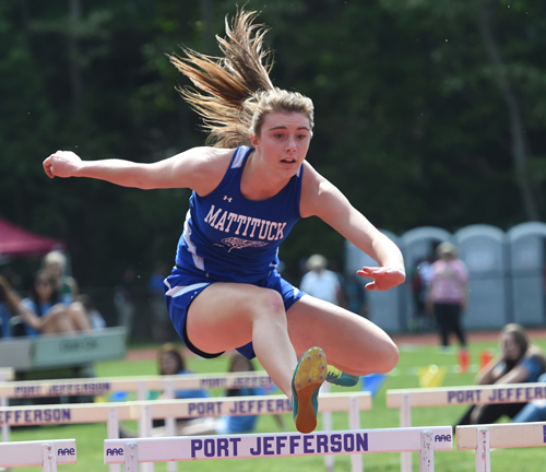 Mattituck's Shannon Dwyer competes in the hurdles of the pentathlon. (Credit: Robert O'Rourk)