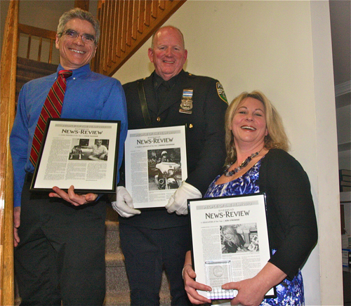 Civic Person of the Year Vince Taldone (left), Public Servant of the Year Dennis Cavanaugh and Educator of the Year Keri Stromski were honored Thursday night at the News-Review's main office in Mattituck.