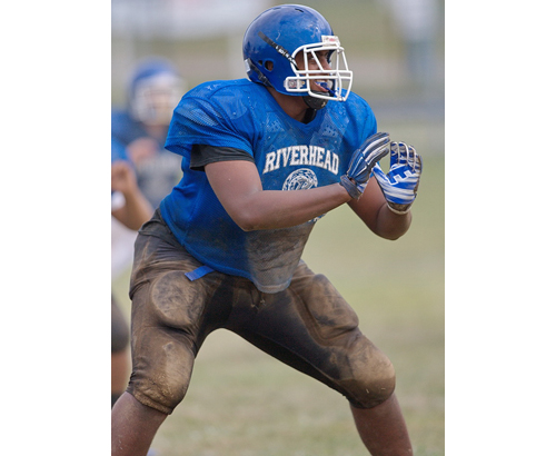 Ethan Greenidge, a 6-foot-5, 320-pound lineman, is one of Riverhead's three all-division players. (Credit: Garret Meade)