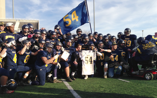 The Shoreham-Wading River football team after winning the Division IV county title Saturday at Stony Brook. (Credit: Joe Werkmeister)