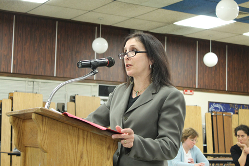 PAUL SQUIRE PHOTO | Jill Sanders, a certified accountant with Cullen & Danowski LLP, delivers positive news to the Riverhead school board Tuesday night.