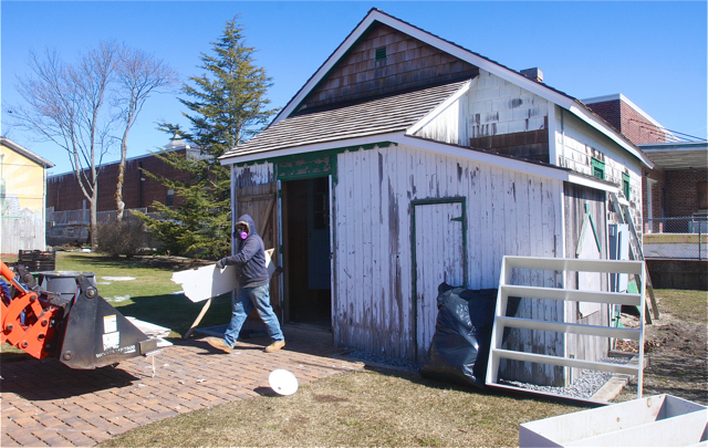 ‘Building and Grounds workers were at the Fresh Pond School house Thursday morning doing renovations to the Fresh Pond Schoolhouse. (Credit: Barbarellen Koch)
