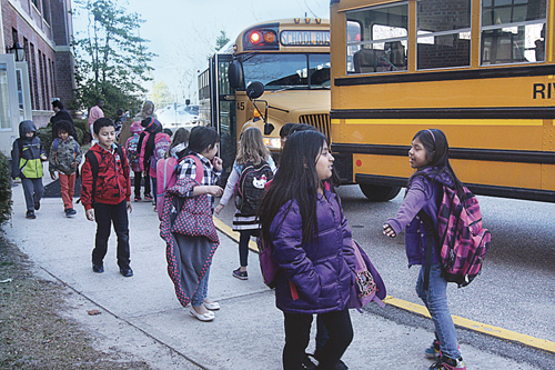 Students leaving Roanoke Avenue Elementary School to board the buses Monday afternoon. (Credit: Barbaraellen Koch)