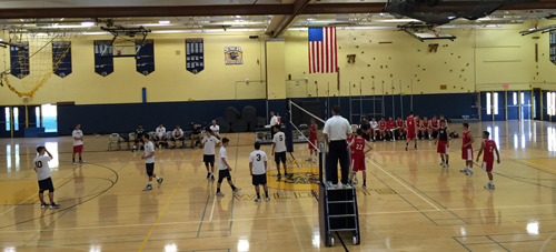 Shoreham-Wading River (white shirts) lines up for its match against Smithtown East on Thursday. (Credit: Bob Liepa)