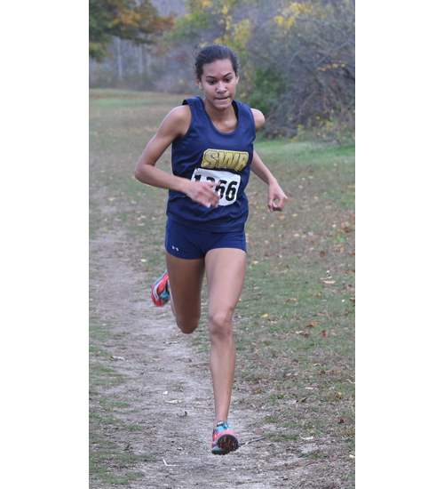 Shoreham-Wading River sophomore battled pain to finish in first place and lead the Wildcats to a second straight county championship. (Credit: Robert O'Rourk)