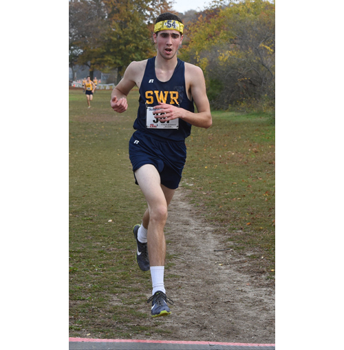 Shoreham-Wading River senior Mike Godfrey qualified for the state meet for the second year in a row. (Credit: Robert O'Rourk)