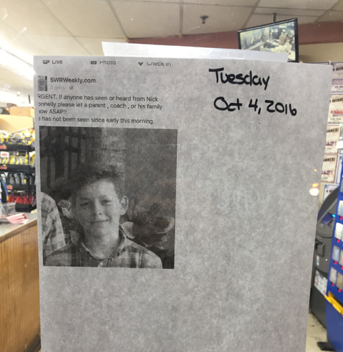 A paper posted on the door of Shop With Us in the Shoreham plaza Tuesday night. (Credit: Nicole Smith)