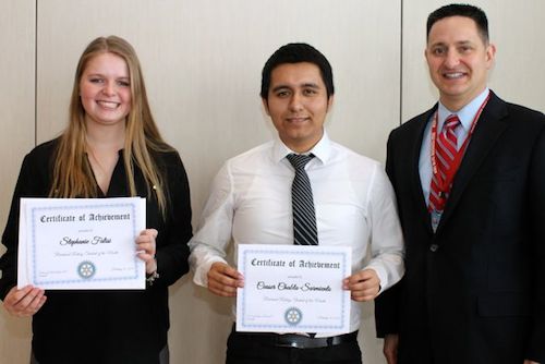 From left, Riverhead High School seniors Stephanie Falisi and Ceaser Chabla-Sarmiento with assistant principal Sean O’Hara at the Feb. 12 Riverhead Rotary Club luncheon. (Credit: Riverhead Rotary)