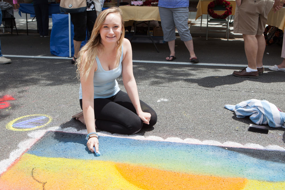Kayla Durney, 16, of Hauppauge works on a sunset painting.