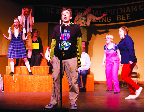 Michael Hipp, center, as Leaf Coneybear, spells the names of South American rodents in a scene from 'The 25th Annual Putnam County Spelling Bee' at North Fork Community Theatre in Mattituck. The musical continues through March 20.