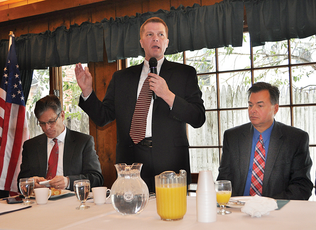 Southold Town Supervisor Scott Russell (center) speaks during a panel event Feb. 26 hosted by the Long Island Board of Realtors at Greenport's Townsend Manor Inn. He's flanked by Riverhead Town attorney Bob Kozakiewicz (left) and Suffolk County Legislator Al Krupski. (Credit: Rachel Young)