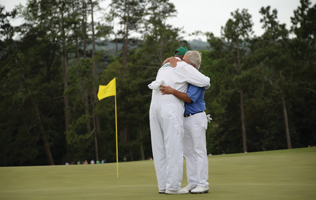Embracing the moment: Hall of Famer Ben Crenshaw hugs his longtime caddy, Carl Jackson. Crenshaw played in his 44th and final Masters Golf Tournament at Augusta National Golf Club. (Credit: Jim Watson/AFP/Getty Images)