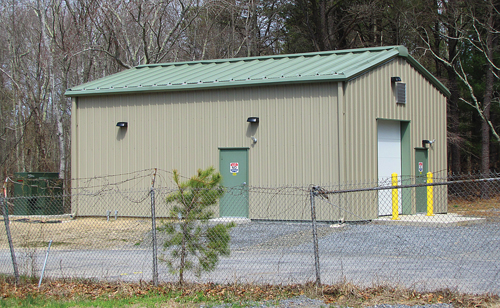 In this building along Grumman Boulevard, polluted groundwater flowing from the Enterprise Park at Calverton is extracted and treated by air strippers before being discharged back into the ground. (Credit: Tim Gannon)