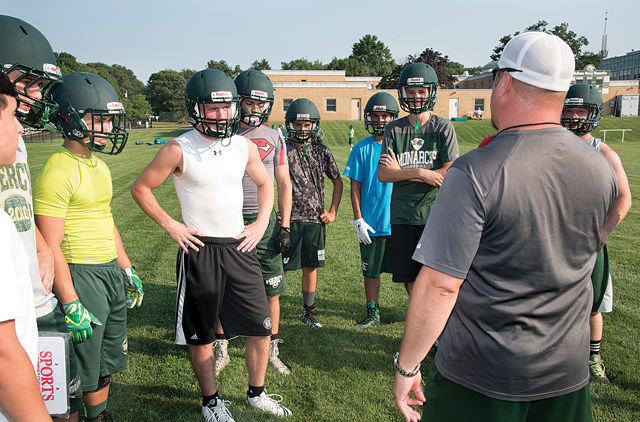 McGann-Mercy football coach Jeff Doroski goes over instructions during a recent practice. (Credit: Robert O'Rourk)