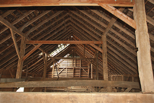 The old beams in the 1760 barn as seen from the hay loft. (Credit: Barbaraellen Koch)