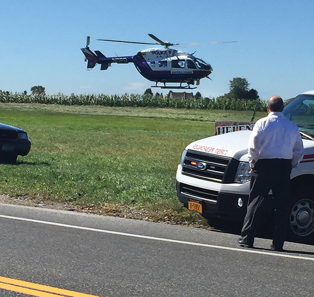 Suffolk County Police airlift an injured bicyclist in Riverhead last week. (Credit: Nicole Smith)