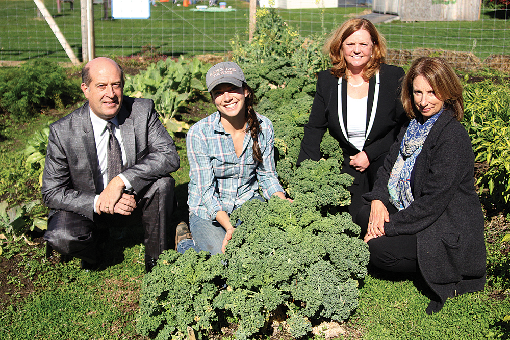 Pictured in Southold Elementary School's garden Monday (from left): Greenport and Southold schools superintendent David Gamberg; Lucy Senesac, Slow Food East End’s master farmer for North Fork schools; Riverhead superintendent Nancy Carney; and Mattituck superintendent Anne Smith. (Credit: Jen Nuzzo)