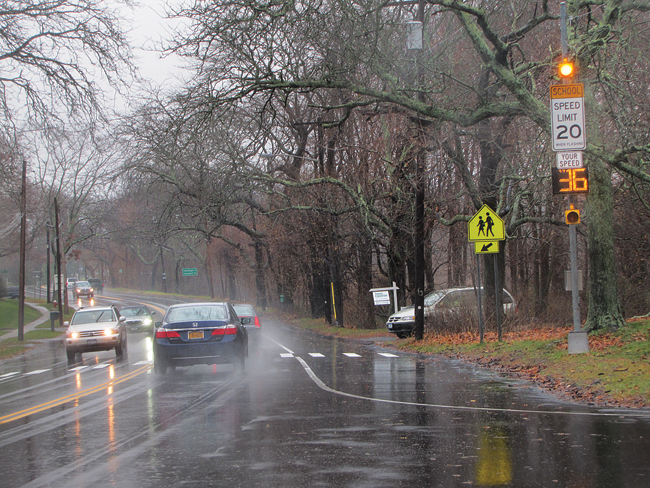 The speed limit posting and radar screen on Main Road outside Mattituck High School. (Credit: Paul Squire)