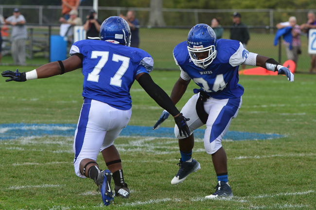 Troy Trent and Raheem Brown celebrate during the Blue Waves' win over Smithtown East Sept. 20. (Credit: Robert O'Rourk, file)