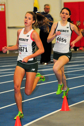 Meg Tuthill races in the 1,500 along with teammate Kaitlyn Buttefield. (Credit: Bill Landon)
