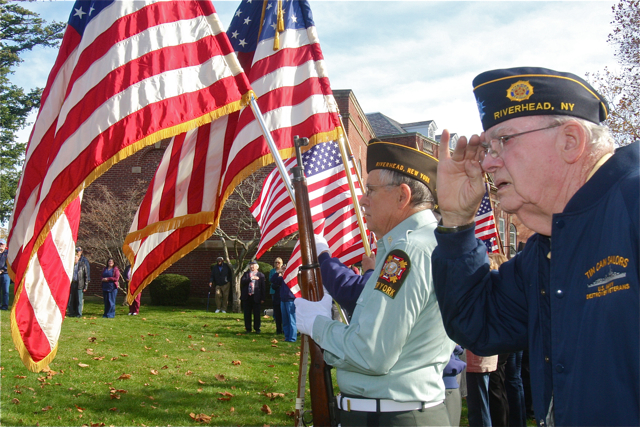 Navy Vet Artie Breen, 80, of Riverhead salutes. (Credit: Barbaraellen Koch)