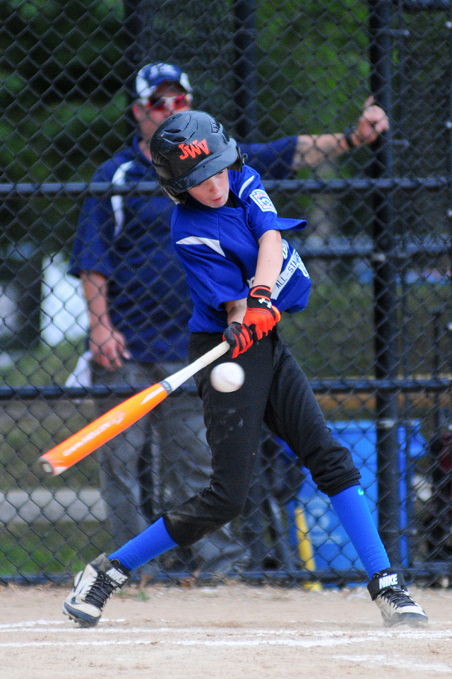 Connor Saville lines a base hit through the infield. (Credit: Bill Landon)