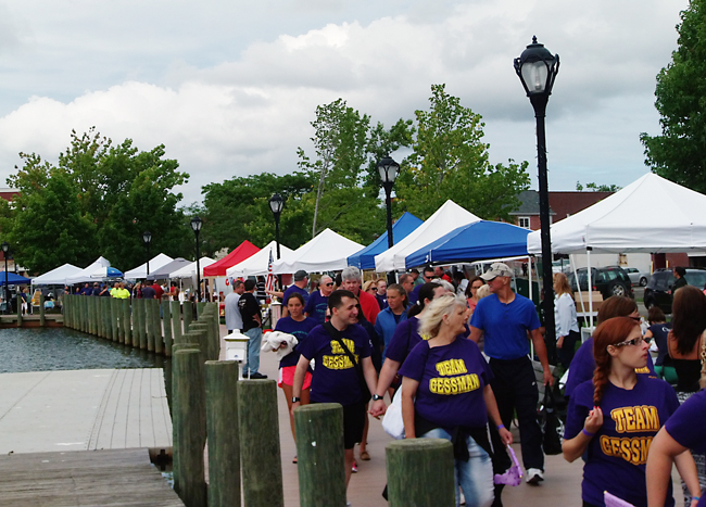 Walkers along the Peconic Riverfront Saturday morning at the third annual Alzheimer's Walk in Riverhead. (Credit: Joe Werkmeister)