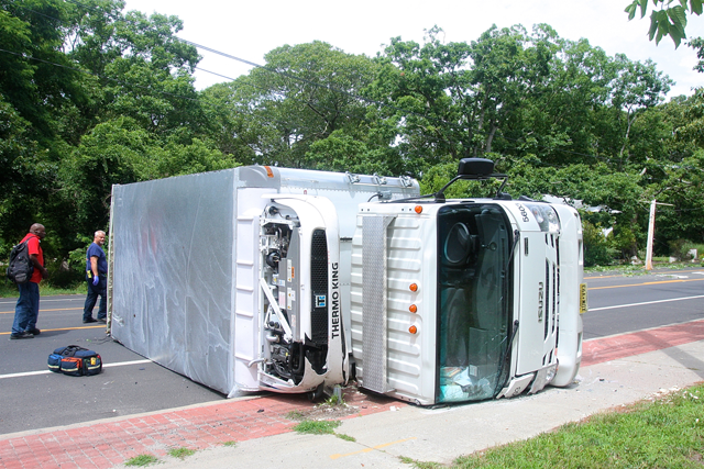 The truck that flipped over on Flanders Road Monday. (Credit: Barbaraellen Koch)