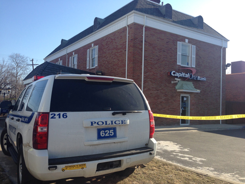 A Riverhead Police car at the East Main Street Capital One bank. (Credit: Paul Squire)