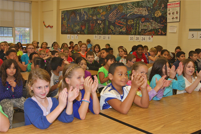 Aquebogue Elementary School third and fourth graders in the cafeteria for the "Buddy Bench" assembly Friday afternoon. (Credit: Barbaraellen Koch)