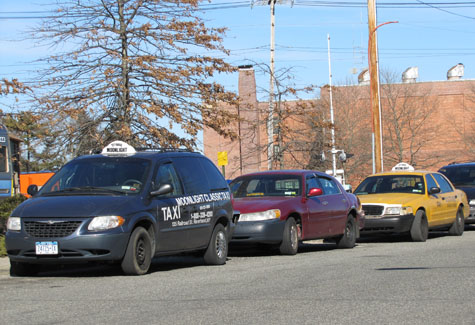 NON PHOTO | Cabs lined up at the LIRR station on Railroad Avenue in Riverhead Thursday.