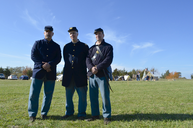 Civil War reenactors Tom Badamo, left, Tom Demaria and Tim MaGee at their camp.