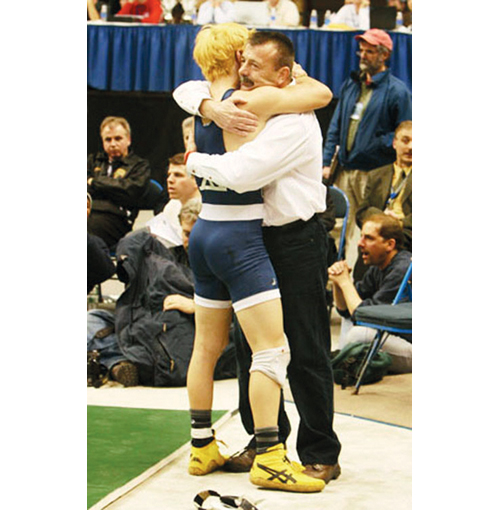 Don Jantzen hugs his son Corey after the finals of the 2007 state championship in Albany. Don retired as Shoreham-Wading River's head coach after that season, which ended with Corey winning a second state title. (Credit: Peter Blasl, file)