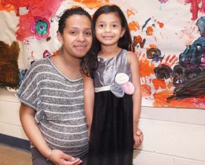 BARBARAELLEN KOCH PHOTO | Jennifer Reyes of Rivehead, 18, with her 3-year-old daughter, Ashley Reyes.
