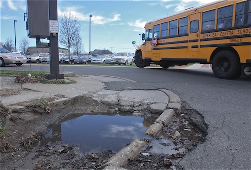 A pothole that developed on the corner of Court Street and Osborn Avenue is raising eyebrows. (Credit: Barbraellen Koch) 