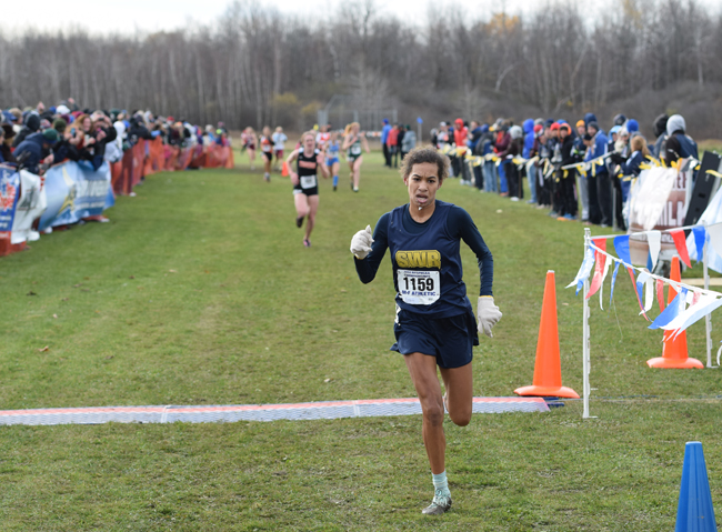 Shoreham-Wading River freshman Katherine Lee, pictured at the state meet Nov. 15, finished fifth Saturday in the federation championship race. (Credit: Kyle Brazeil/MileSplit NY)