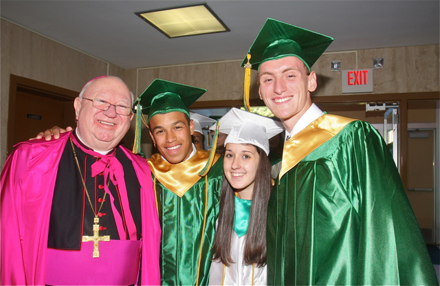 Rockville Centre Diocese Bishop William Murphy, poses with students (from left) Paul Annunziato of Mattituck, Danielle Allen of Aquebogue and Matt Abazis of Center Moriches. (Credit: Barbaraellen Koch)