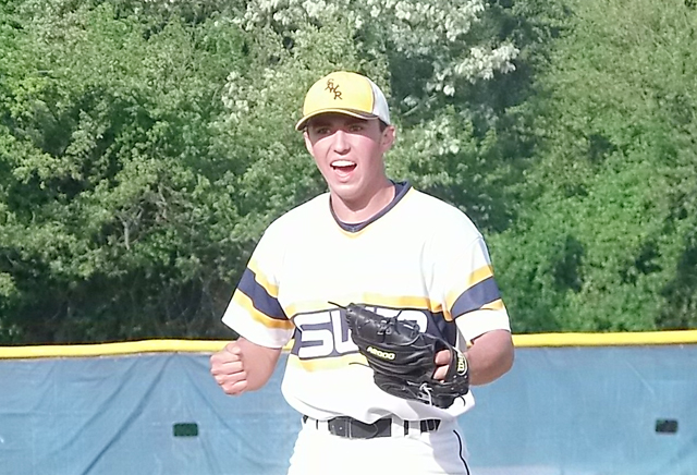 Shoreham-Wading River sophomore Brian Morrell celebrates after striking out the final batter of the game in the Wildcats' Game 3 win over Glenn Tuesday. (Credit: Joe Werkmeister)