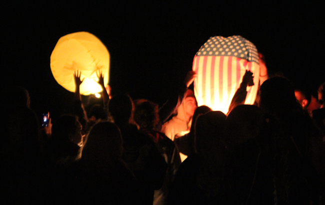 Classmates lit lanterns in memory of Tom last Thursday night, including one with the American flag colors. (Credit Jen Nuzzo)