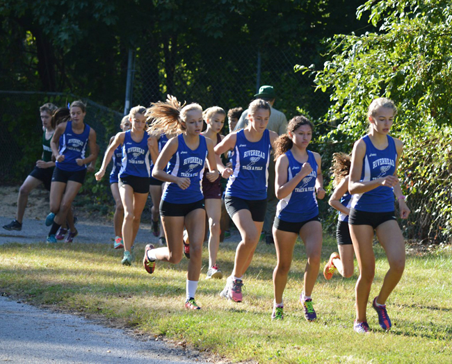 The Riverhead girls cross country team, pictured in a meet earlier in the season, improved to 3-1 with a win Tuesday. (Credit: Charles Christ)