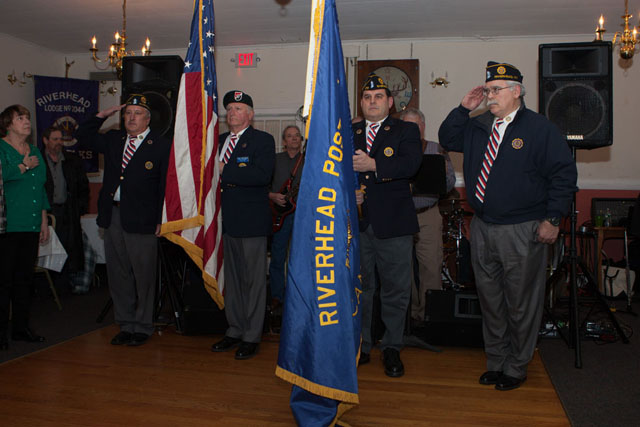 The Riverhead American Legion Color Guard opens the event with the presentation of the colors