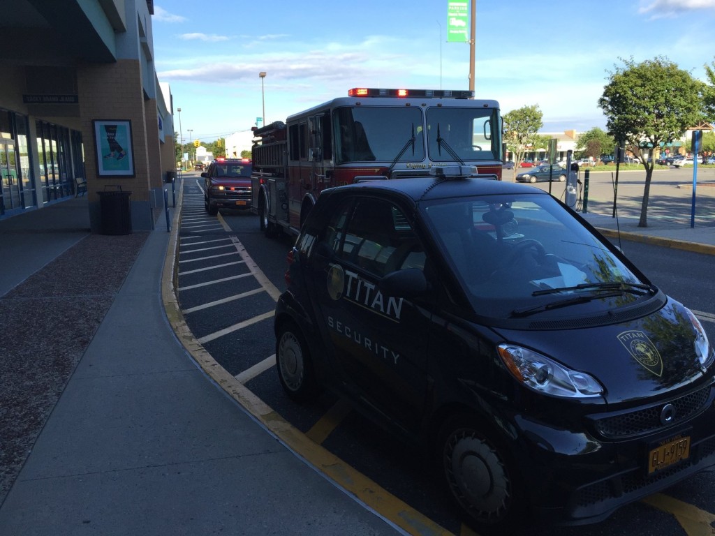 Firefighters park outside the Tanger 1 outlets during Monday's brief power outage. (Credit: Paul Squire)
