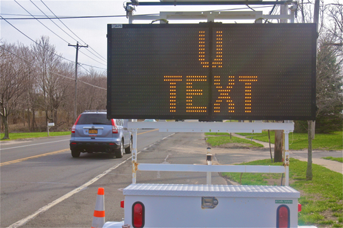All across the East End, drivers were advised to stop texting while driving. (Credit: Barbaraellen Koch)
