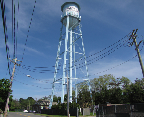 TIM GANNON PHOTO | The 'tin man' style water tower on Pulaski Street in Riverhead.